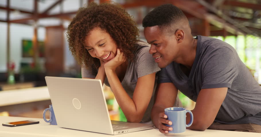 Couple looking at laptop